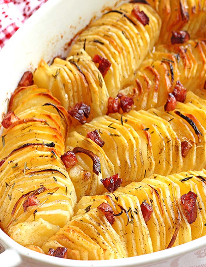 The crispy potato roast with thinly sliced and seasoned potatoes - A beautiful and unique way to serve potatoes - great for holidays, or to make a regular day feel like one.
