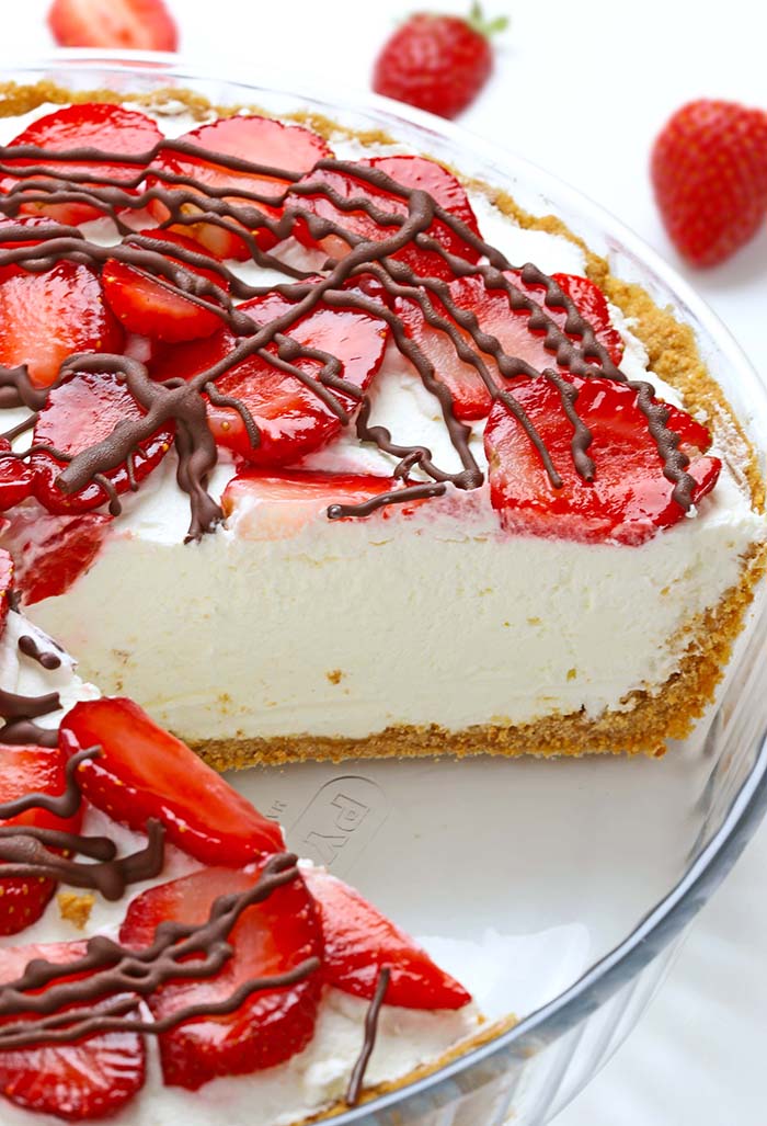 An easy strawberries and cream pie made with graham crackers, whipped cream, cream cheese and fresh strawberries. 