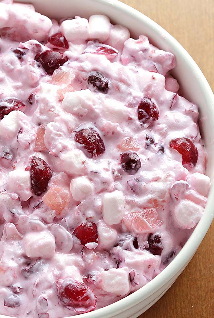 Cranberry Cheesecake Fluff Salad – delicious, absolutely loaded with cranberries tossed in a thick, rich and creamy cheesecake mixture, a must have for Thanksgiving and Christmas family get-togethers