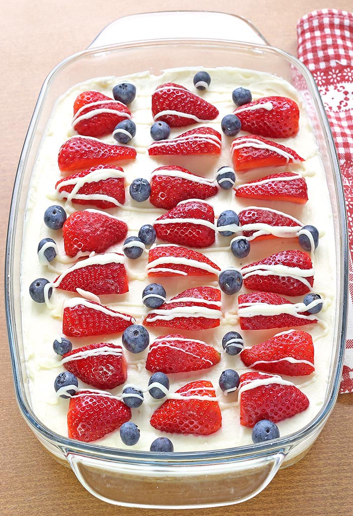 These summer berry cheesecake bars will be the hit at your next summer picnic! Quick to make buttery crust, topped with luscious cheesecake layer and piled high with fresh berries.