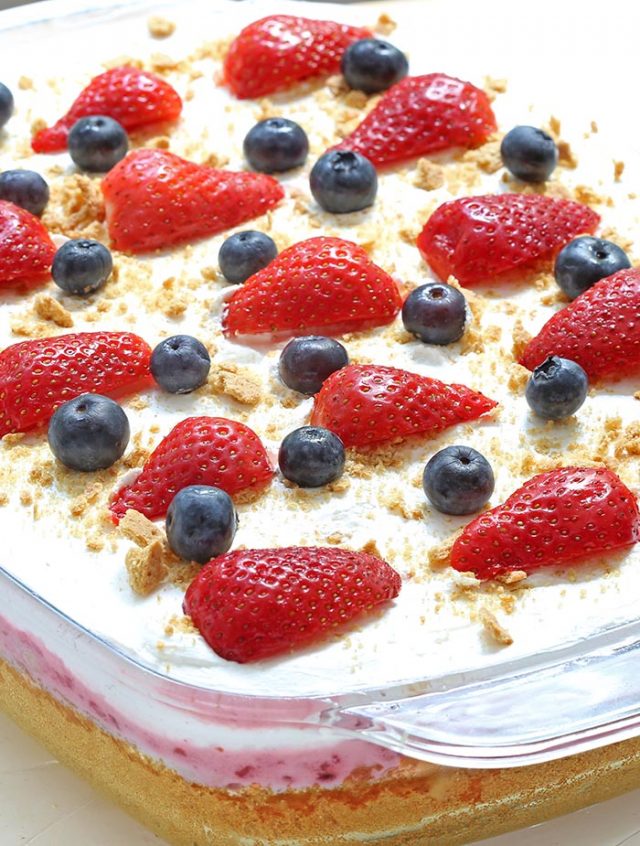 Summer Berry Cheesecake Poke Cake - Cakescottage