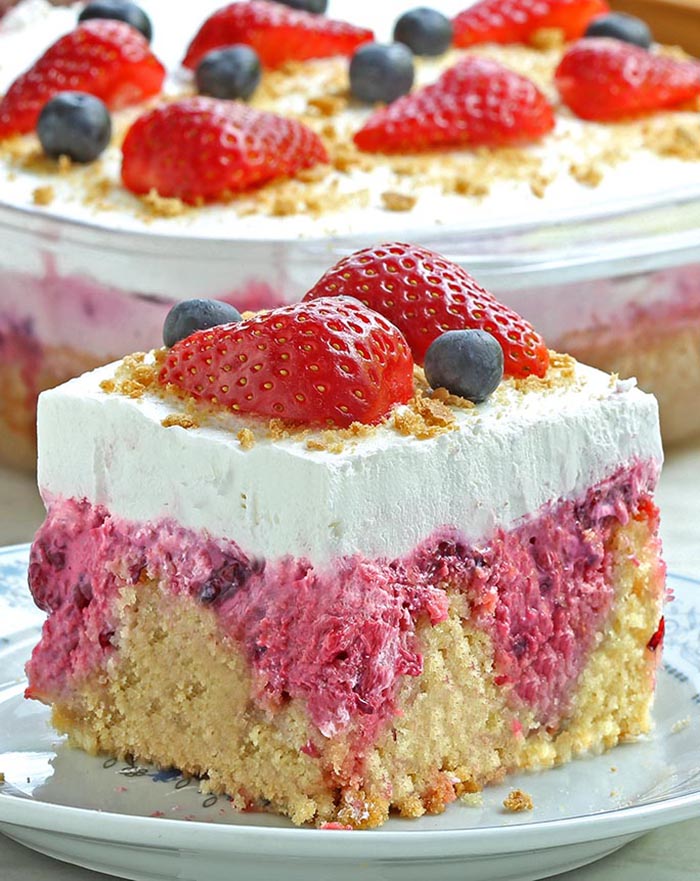 Summer Berry Cheesecake Poke Cake is a perfect red, white, and blue dessert for your Memorial Day, 4th of July BBQ’s or any family get-together…