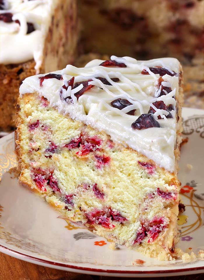 This is the perfect Cranberry Christmas Cake! All of the holiday flavors you love in the Starbucks’ Cranberry Bliss Bars in the cake form.