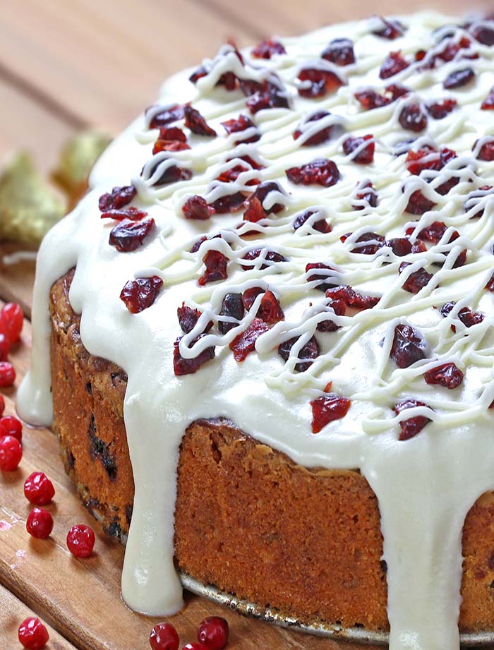 This is the perfect Cranberry Christmas Cake! All of the holiday flavors you love in the Starbucks’ Cranberry Bliss Bars in the cake form.