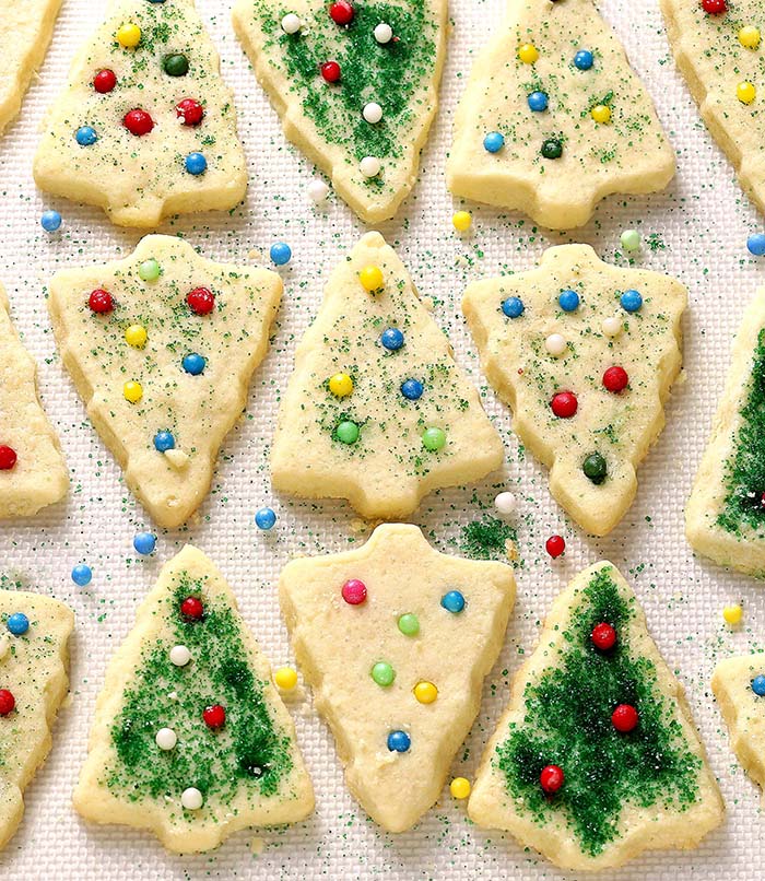These delicious, buttery and melt in your mouth Christmas Shortbread Cookies look like they came from a fine bakeshop! Perfect for gifting and parties, people of all ages love them!
