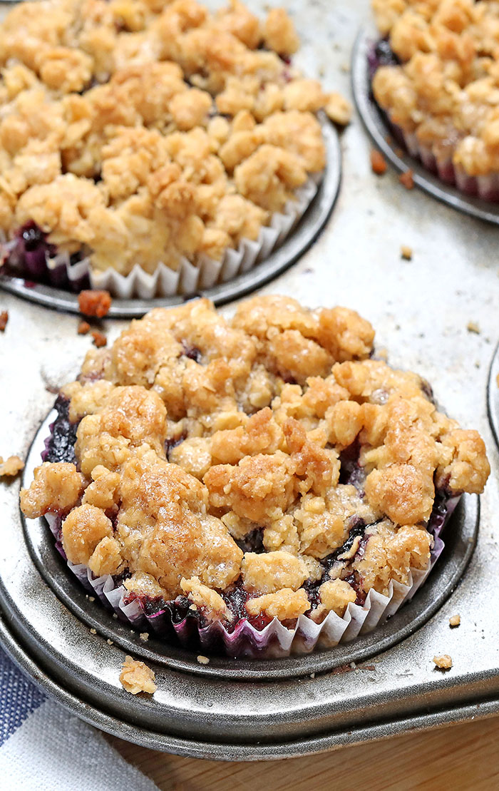 Blueberry Crumble Mini Cheesecakes are delicious just like your favorite blueberry crumble, baked on graham cracker crust and packed into perfect portable cheesecake dessert.
