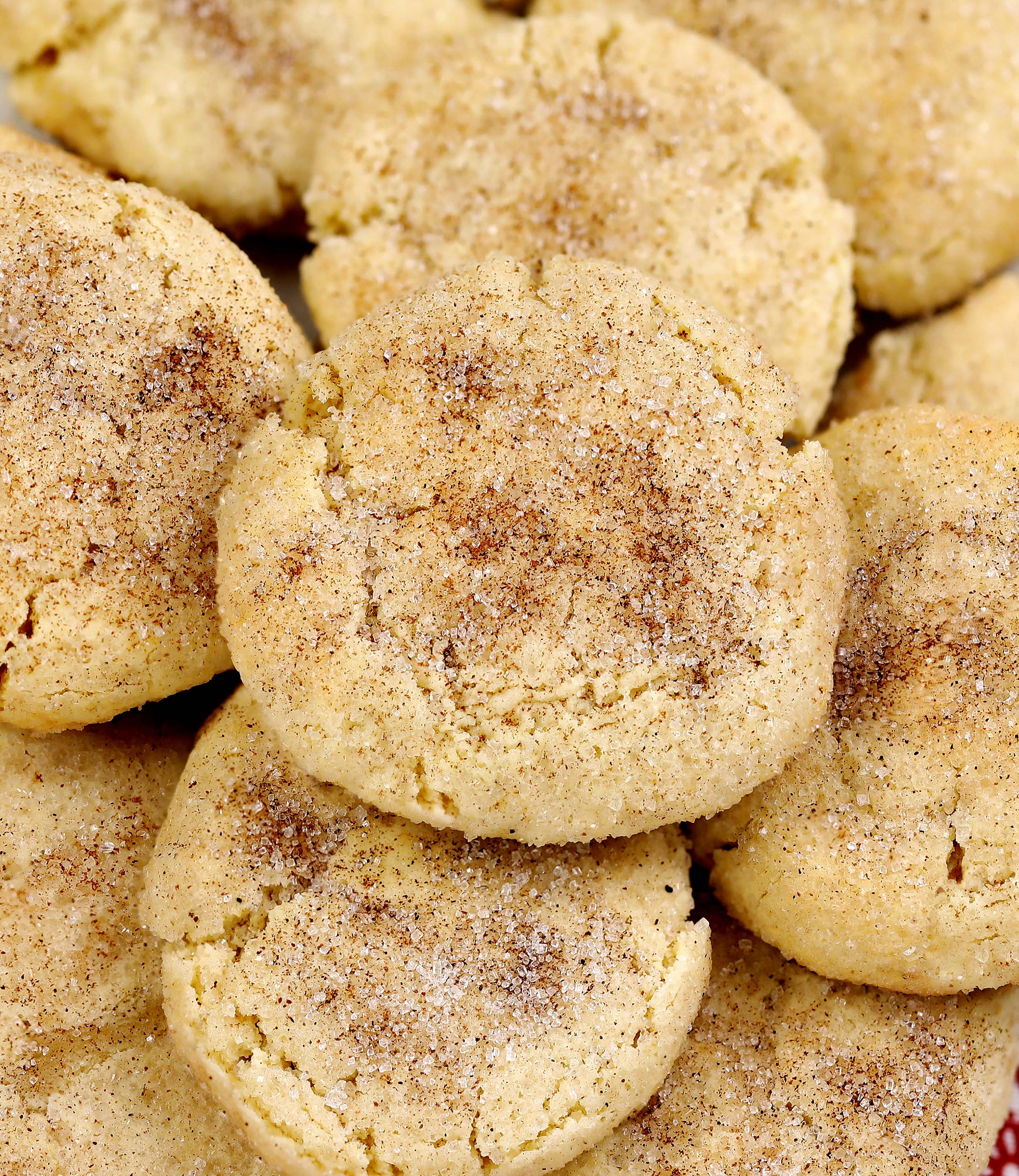 Eggnog Snickerdoodles - your favorite sugar cookie with a Christmas twist. Soft, chewy texture, and flavors of eggnog and spices — they’re sure to be a big hit!