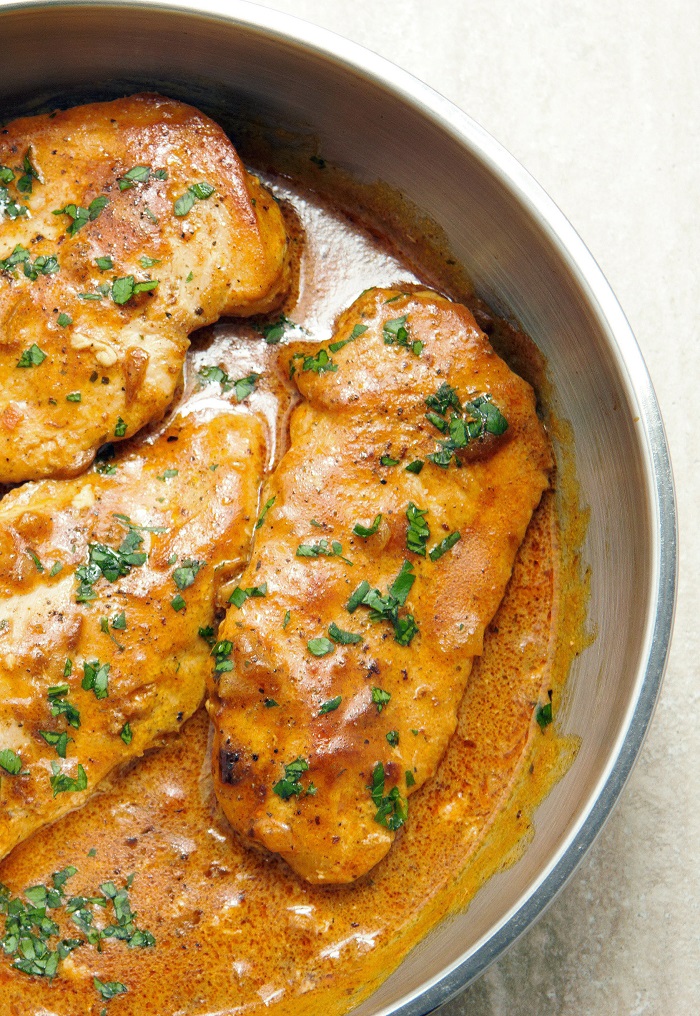 Skillet Chicken in Onion Sauce - Crispy, golden chicken on the outside and tender on the inside in balsamic caramelized onion cream sauce is a winner of a chicken dinner!