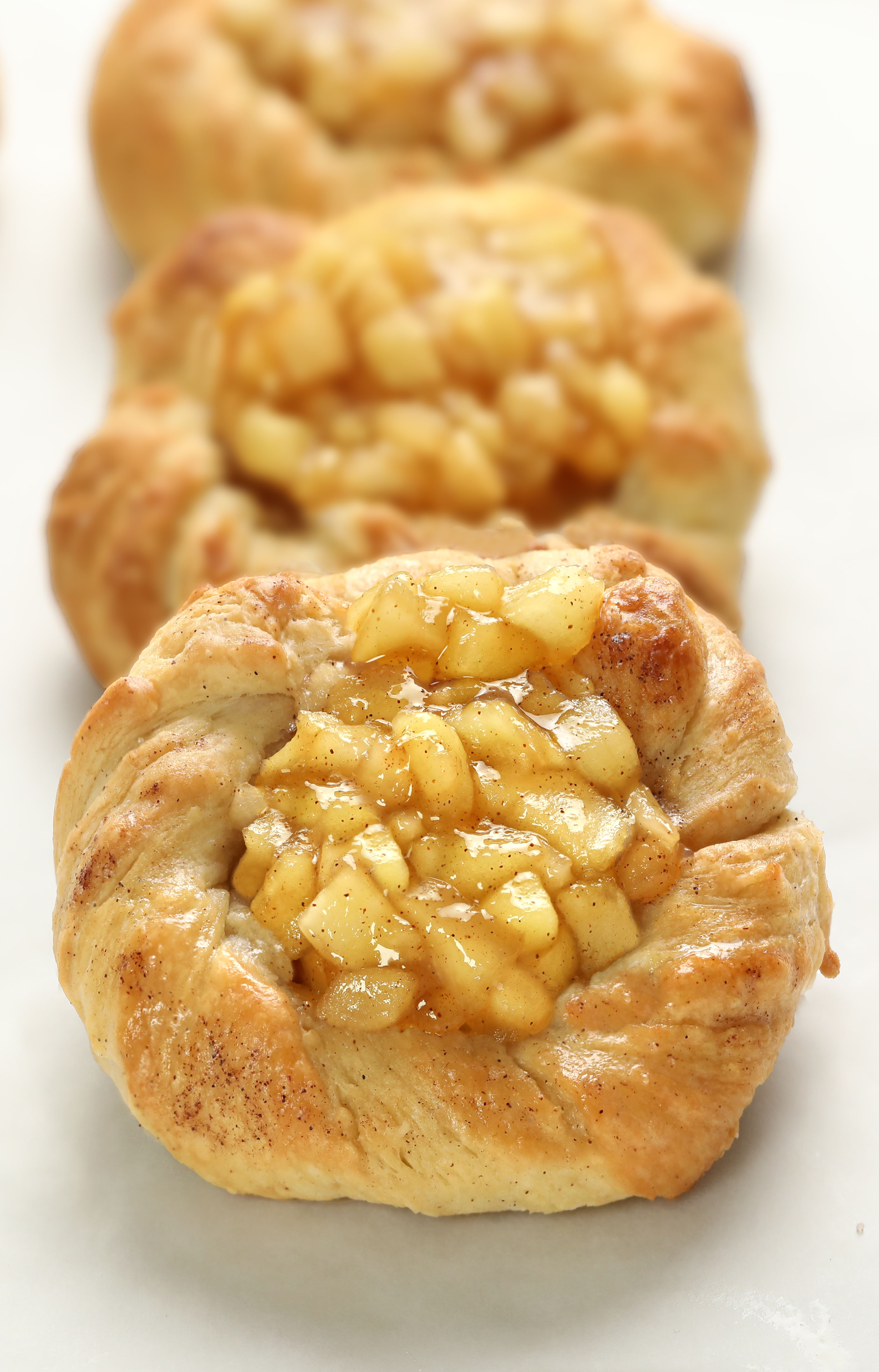 Crescent Roll Apple Danish recipe is fast, delicious, and made with crescent roll dough, fresh apples for the apple pie filling, and a simple sugar glaze!