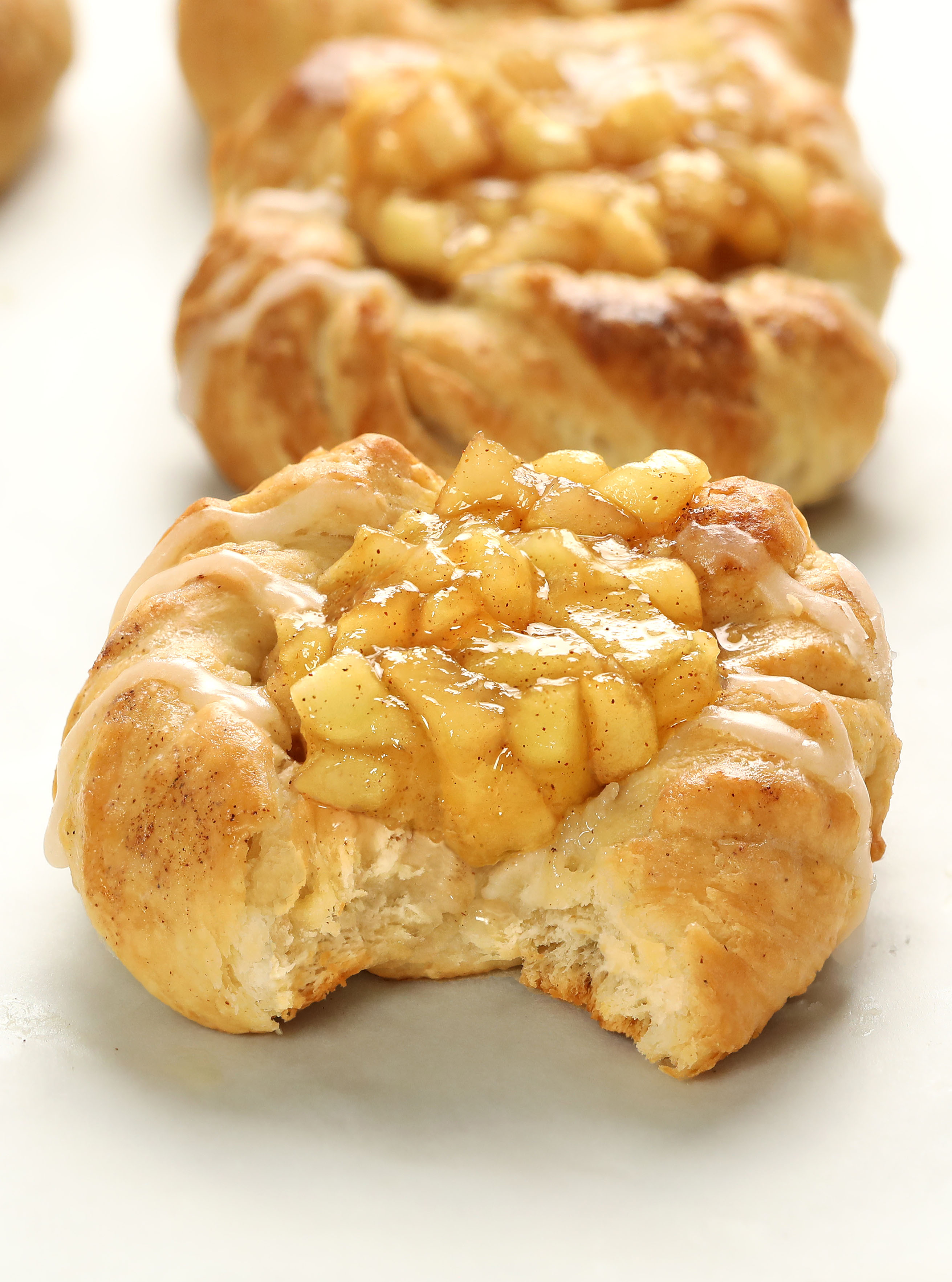 Crescent Roll Apple Danish recipe is fast, delicious, and made with crescent roll dough, fresh apples for the apple pie filling, and a simple sugar glaze!